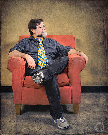 Man in an Orange Chair